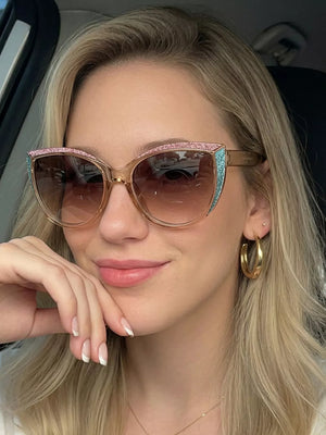 silver sunglasses featuring UV400 protection and glitter