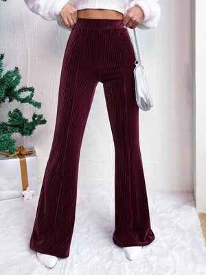 Burgundy corduroy high-waist flare maternity pants with bell bottoms.