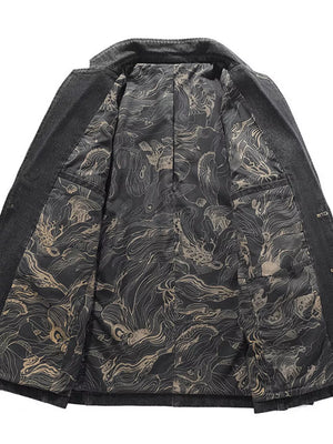 Men's black denim blazer with a detailed dragon print lining and button closure.