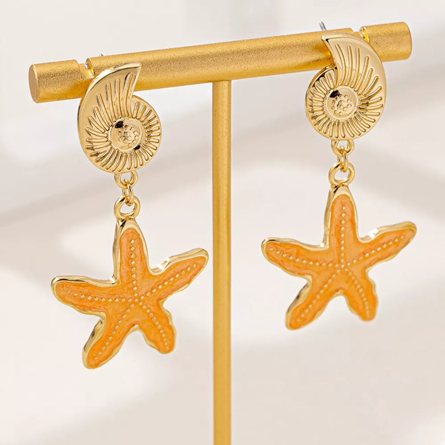 peach earrings featuring drop design and nautical-motif
