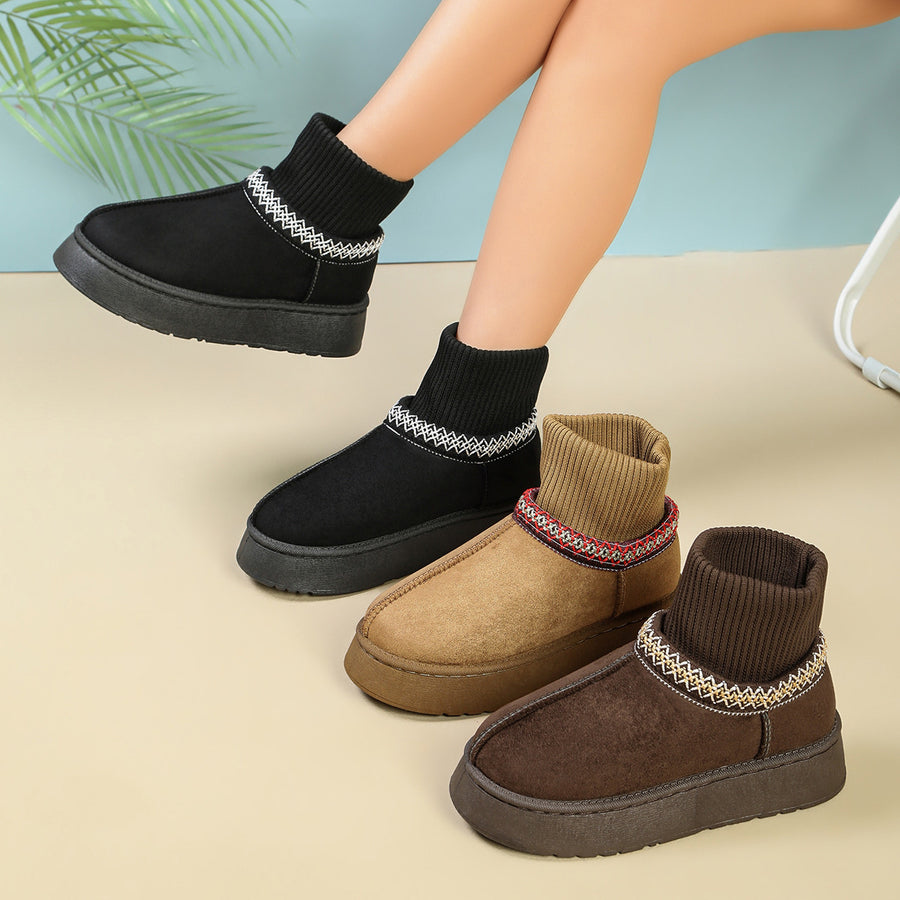 boots in black featuring knit cuff and platform boots fit