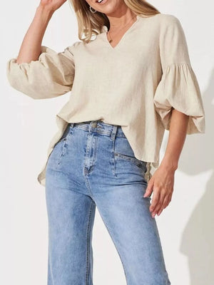 Maternity beige linen blend shirt with notched V-neck and balloon sleeves.