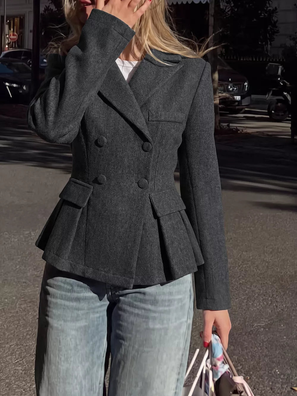 Charcoal grey double-breasted peplum blazer with button details and flap pockets.