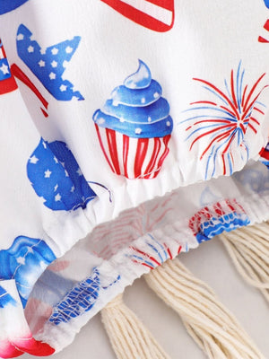 Baby one-piece with patriotic cupcake and firework print, ruffle sleeves, and decorative tassels.