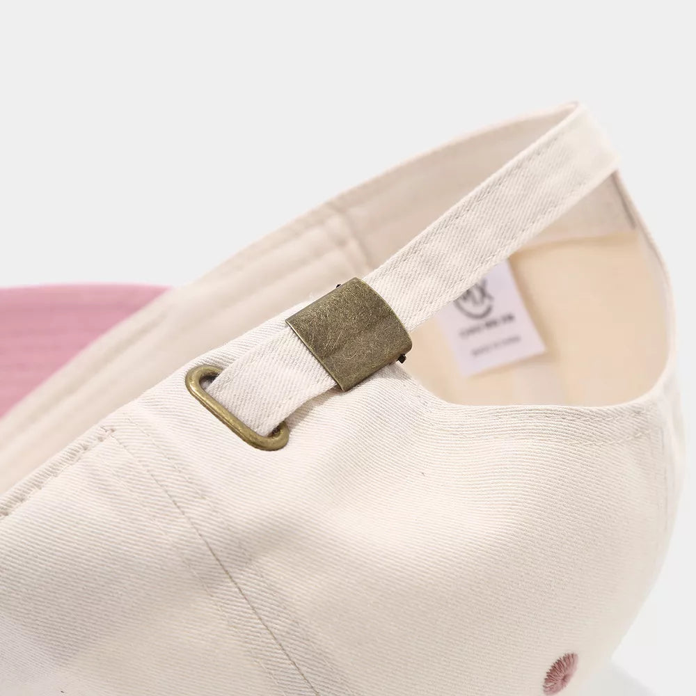 cap in cream with color-block and curved brim