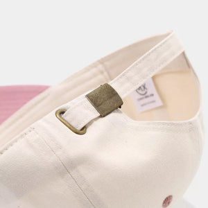cap in cream with color-block and curved brim