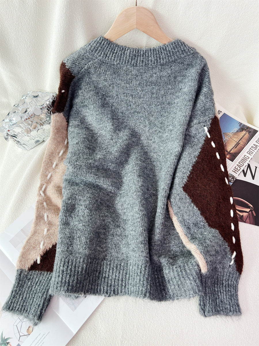 dark brown v-neck sweater with ribbed cuffs and long sleeve