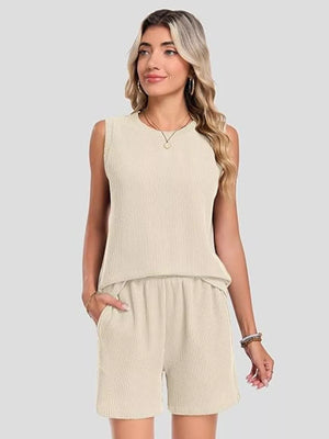 Apricot ribbed knit set with sleeveless top and pocketed shorts.