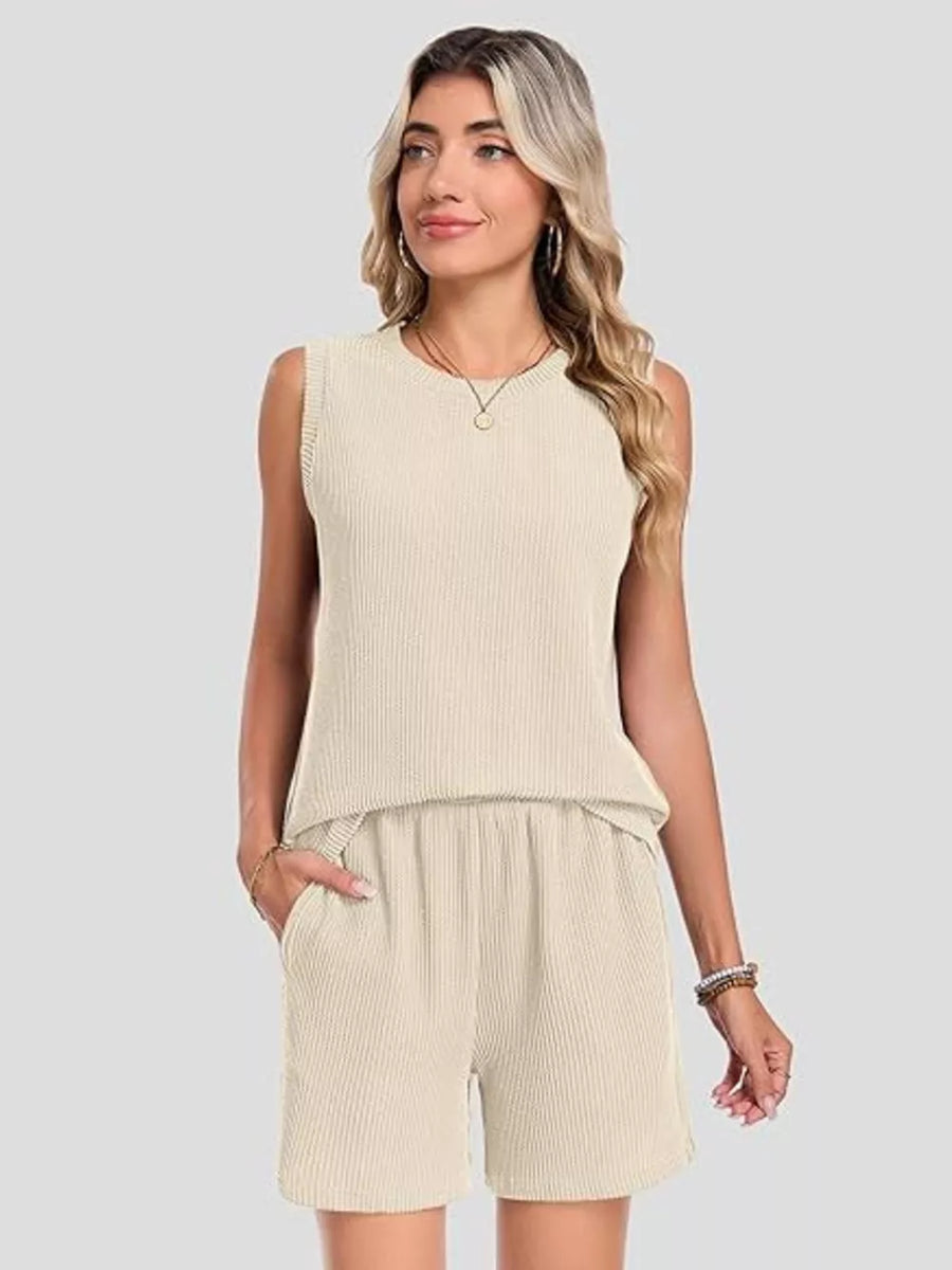 Apricot ribbed knit set with sleeveless top and pocketed shorts.