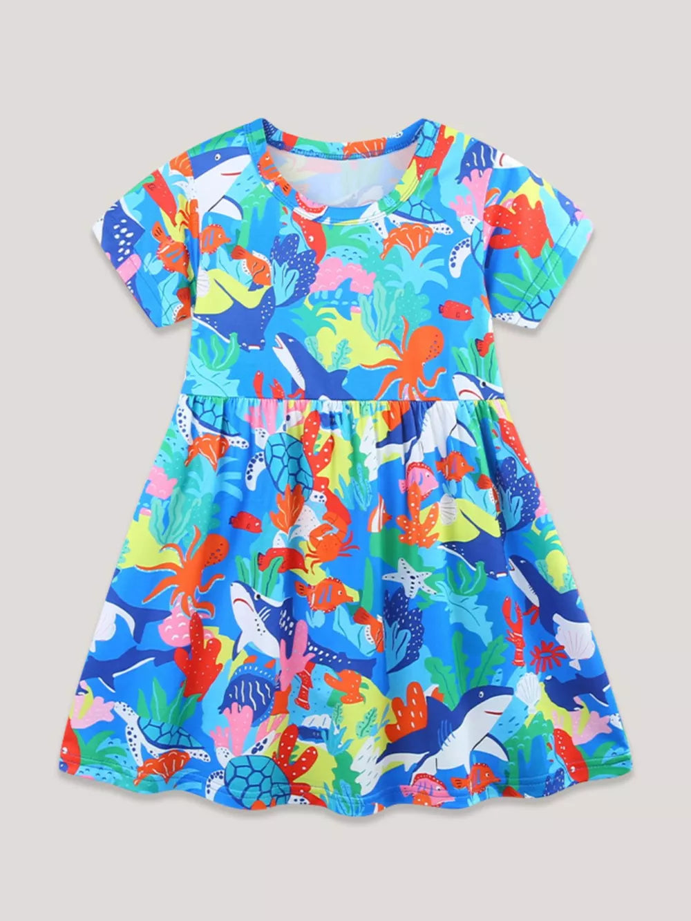 Toddler a-line dress with short sleeves and ocean-themed print featuring sharks, turtles, and octopuses.