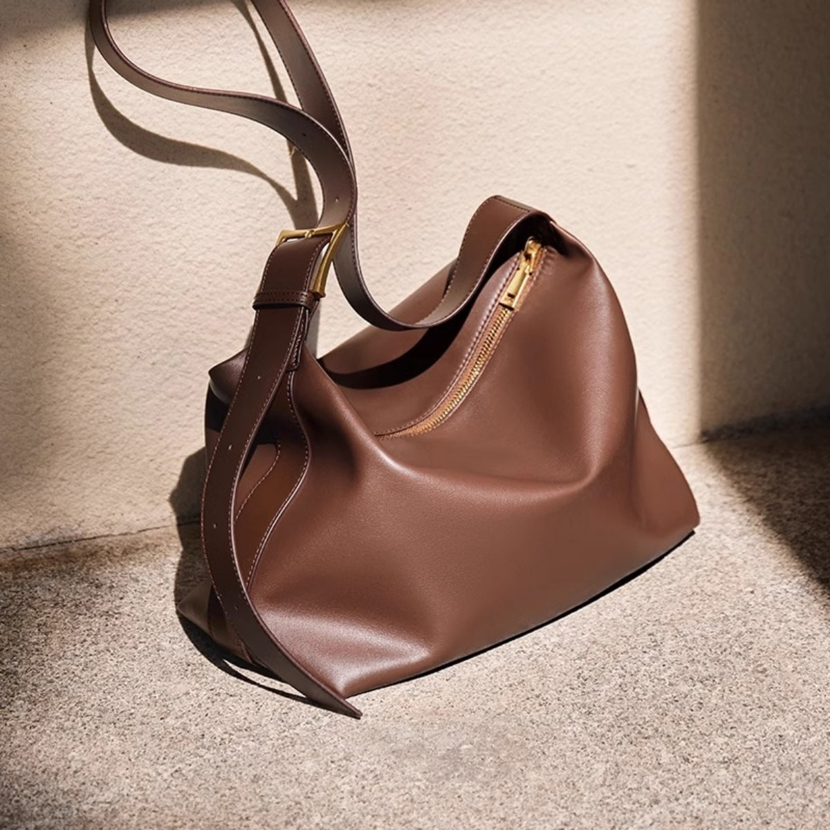 Caramel pu leather shoulder bag with gold buckle and zipper detail