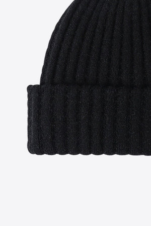 Black acrylic ribbed knit beanie with a folded cuff