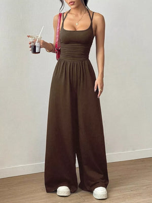 jumpsuit in dark brown featuring ruched and flared fit
