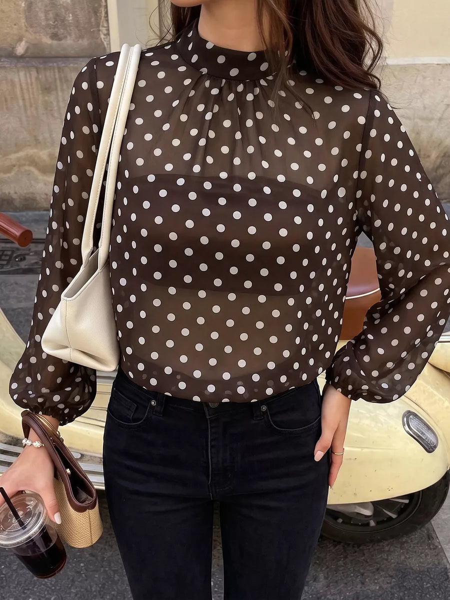 blouse featuring polka dot in white with 100% polyester Care instructions: Machine wash cold texture