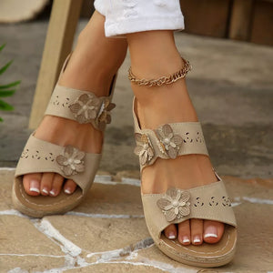 Beige floral appliqué mid-heel sandals with cut-out details and a gold anklet.
