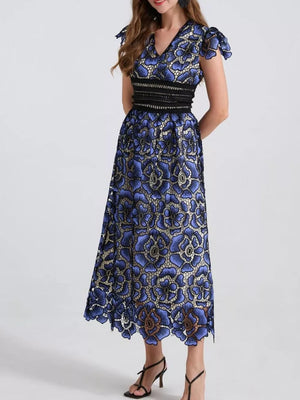Blue floral lace midi dress with V-neck, short sleeves, and black waistband.