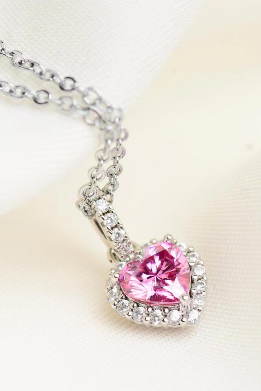 Pink heart halo pendant necklace in 925 sterling silver with clear cubic zirconia accents