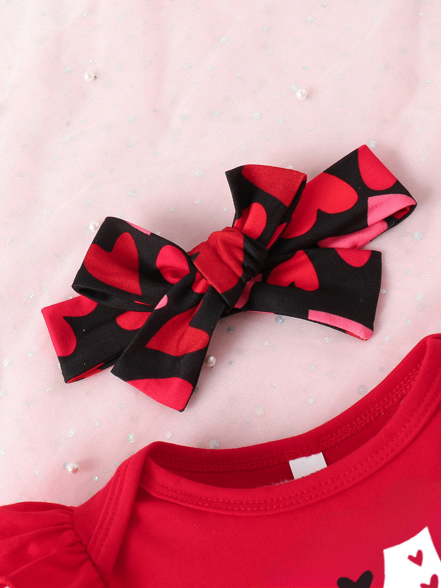 Red baby bodysuit with ruffled sleeves and heart print headband.