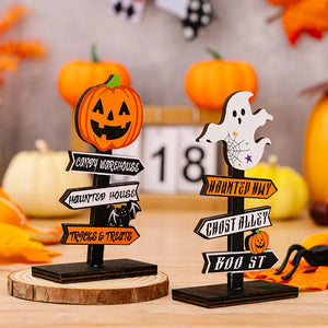 Spooky signpost decor with pumpkin and ghost, featuring Halloween destinations like Candy Warehouse and Haunted House.