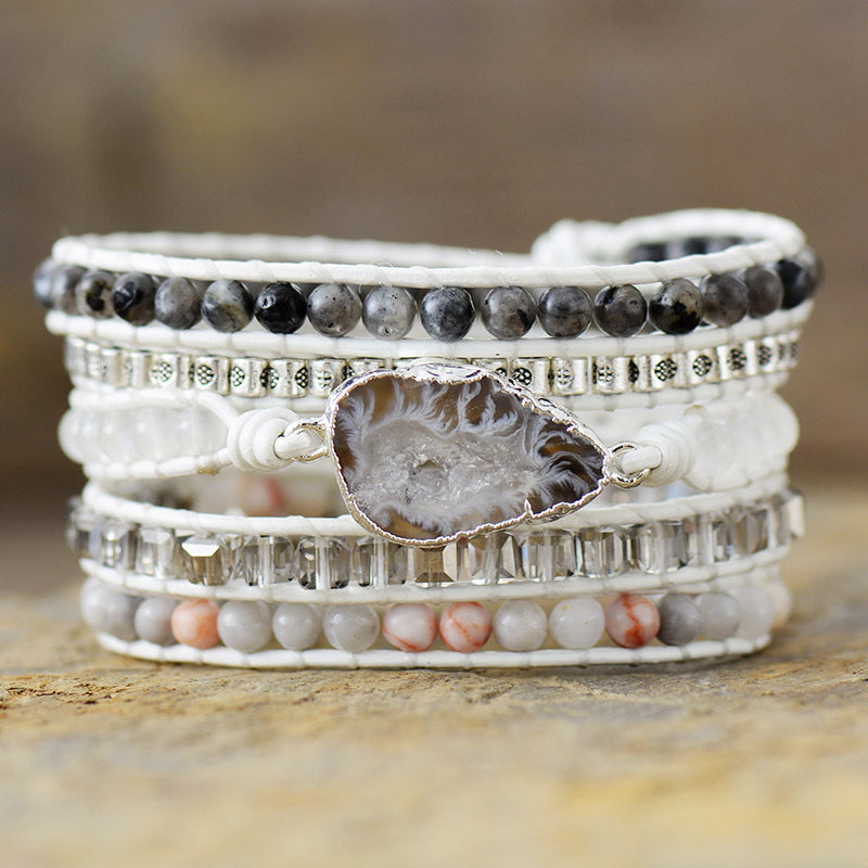 Wrap-around geode stone bracelet with white leather and mixed beads.