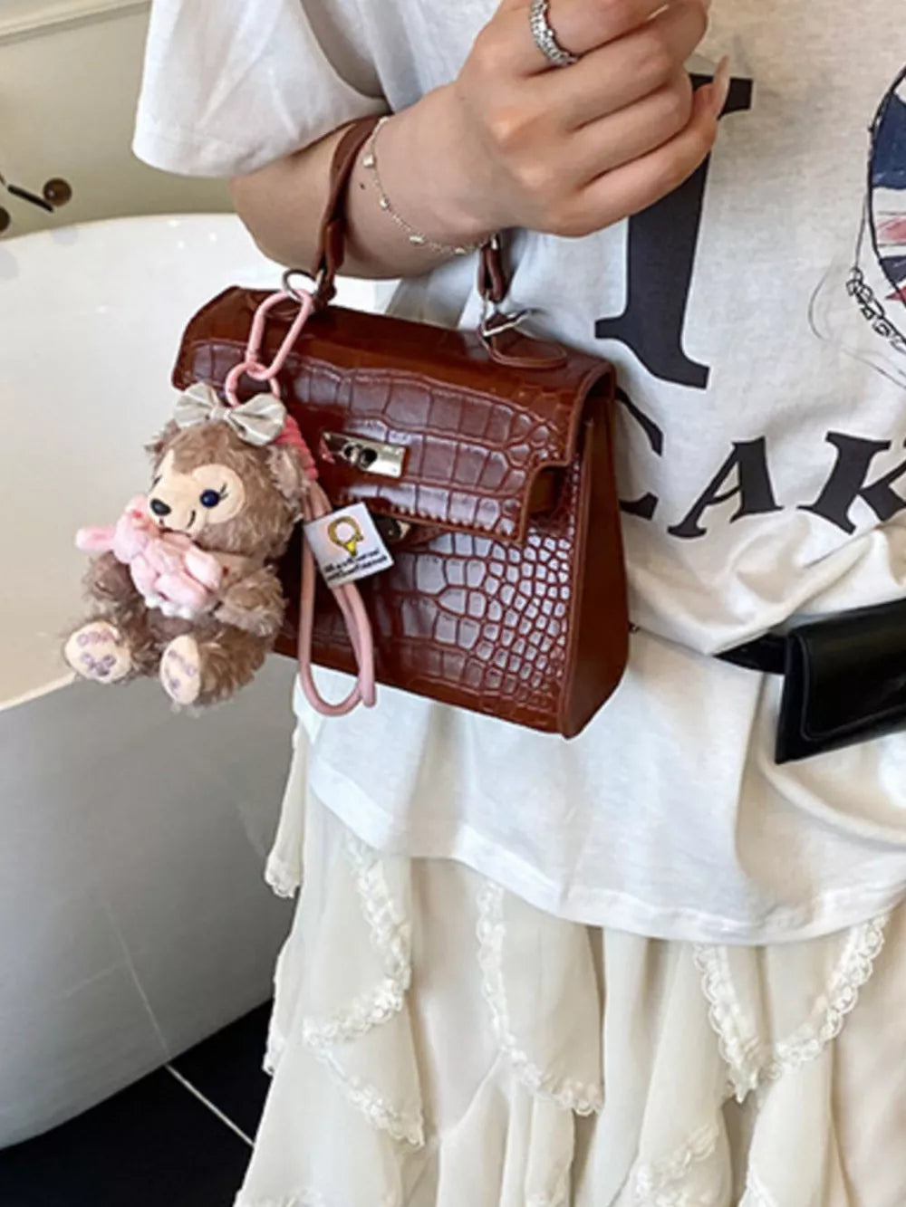 Crocodile-embossed Medium Handbag in Brown