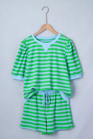 Striped knit pajama set with green and blue horizontal stripes, featuring a crew neck top and drawstring shorts.