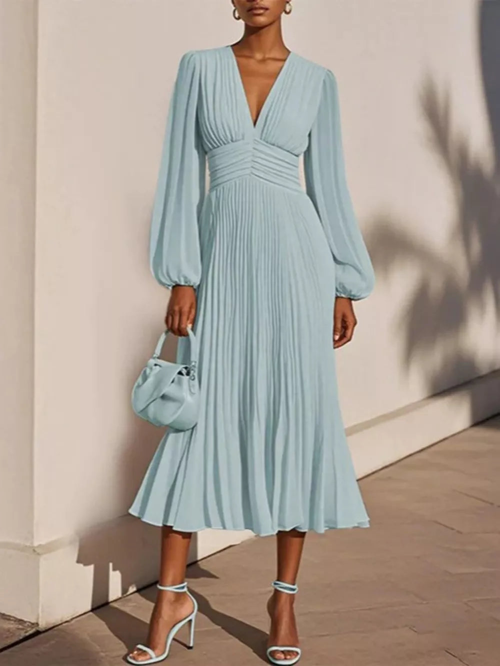 midi dress in sky blue featuring pleated and A-line fit