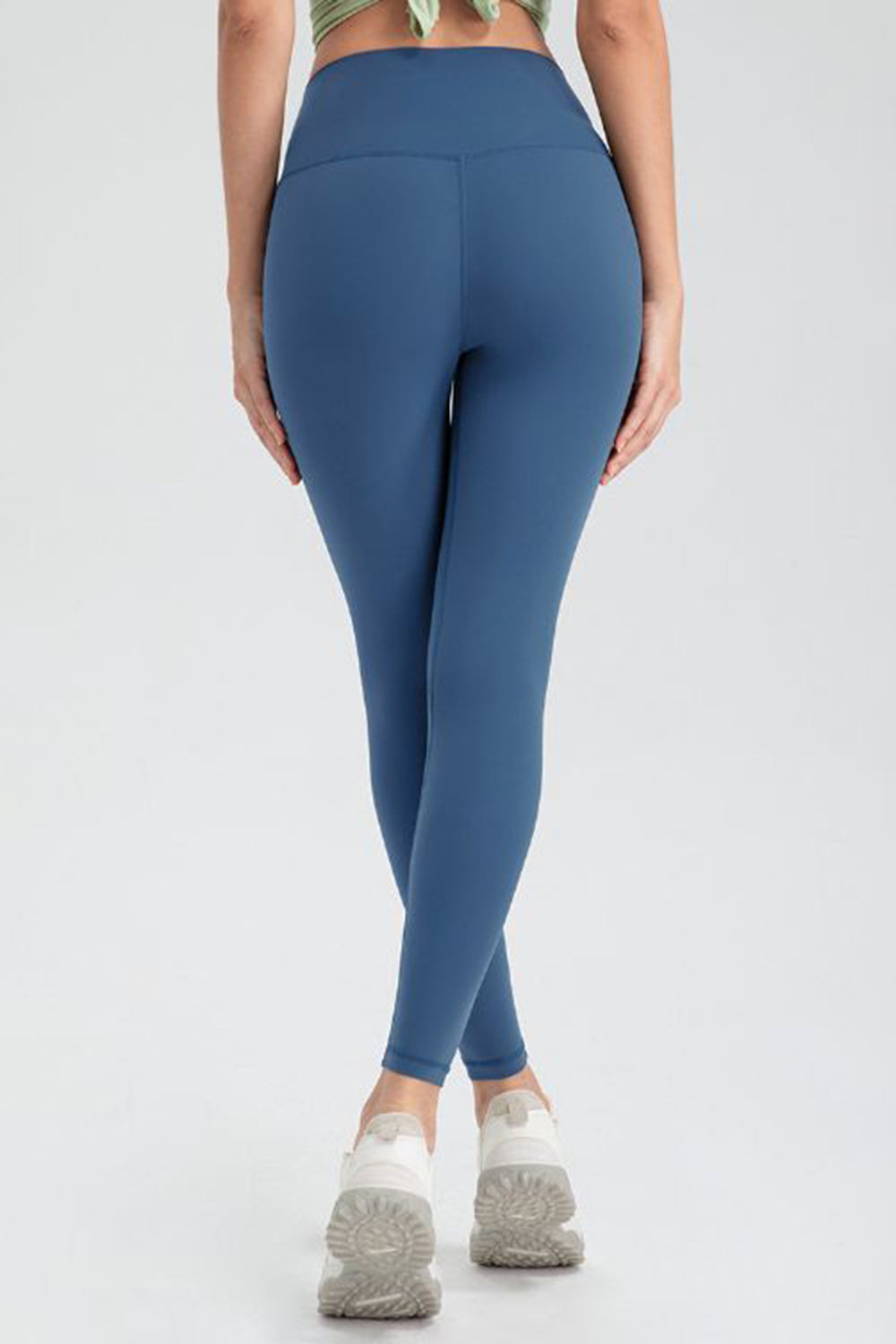 Dusty Blue high-waist performance leggings with sculpted seams and a full-length cut.