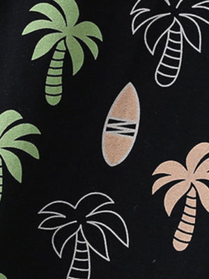 Toddler tee and shorts set in black with tropical palm tree and surfboard print.