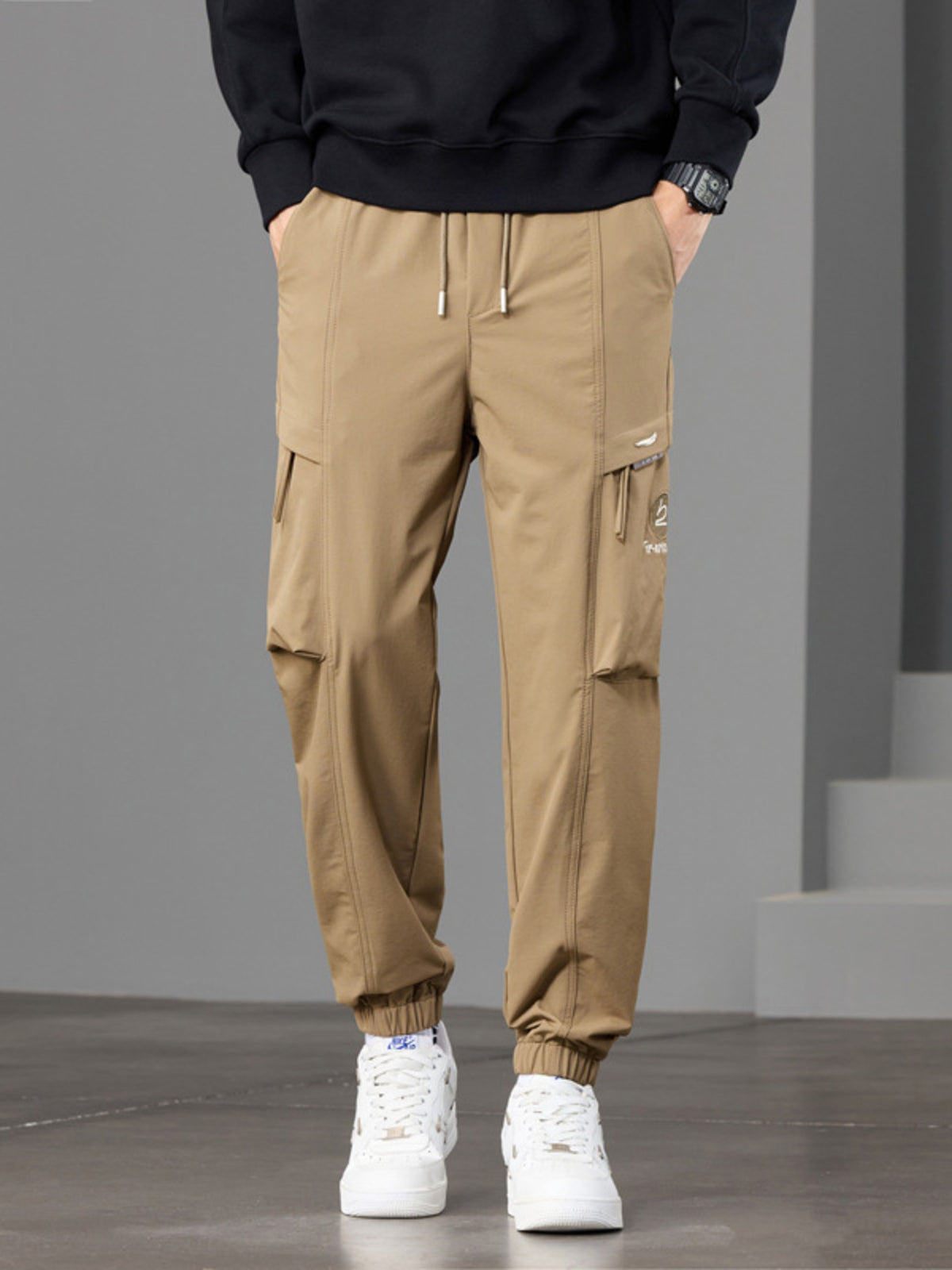 joggers in tan featuring pocketed and tapered fit