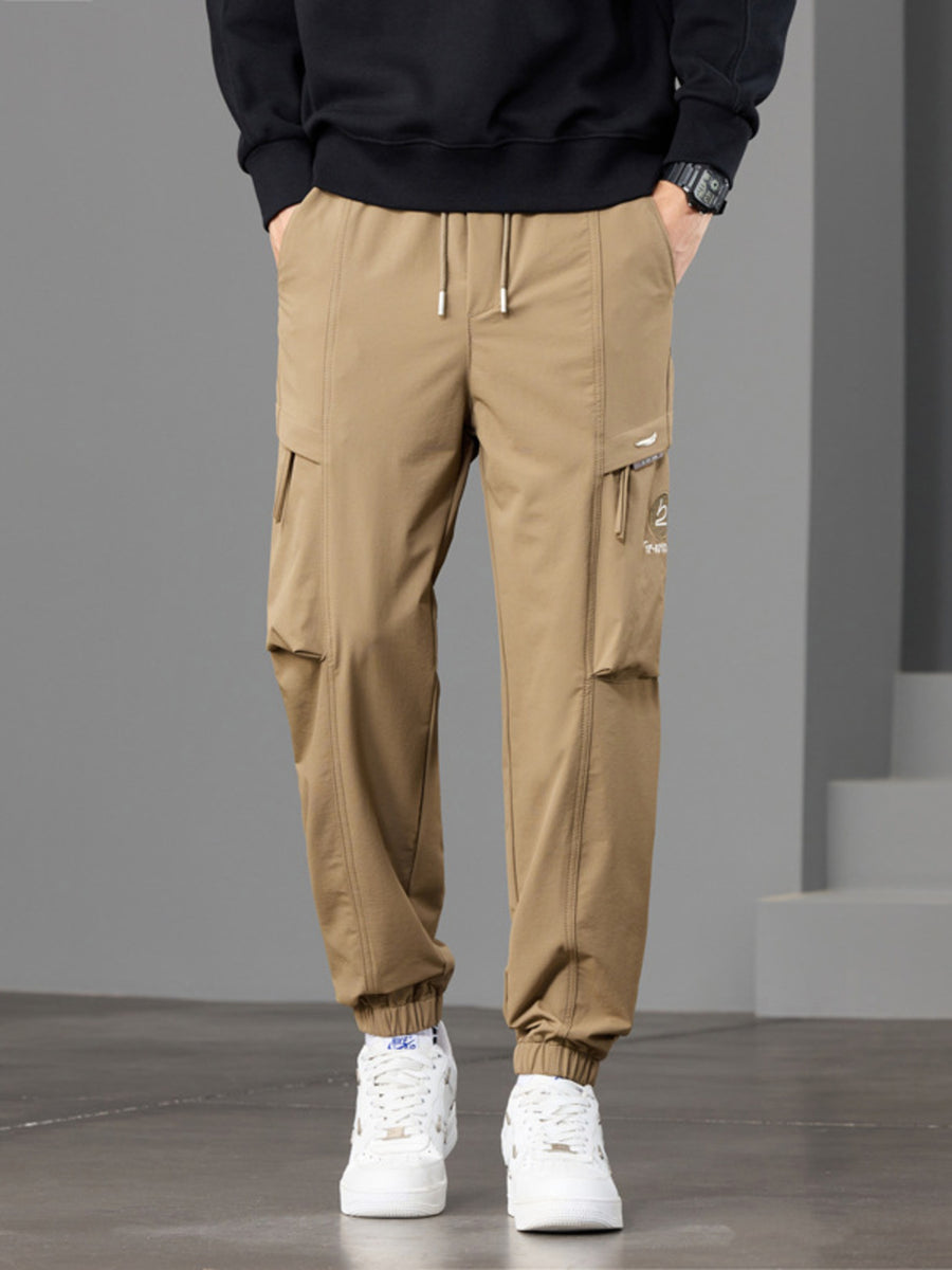 joggers in tan featuring pocketed and tapered fit