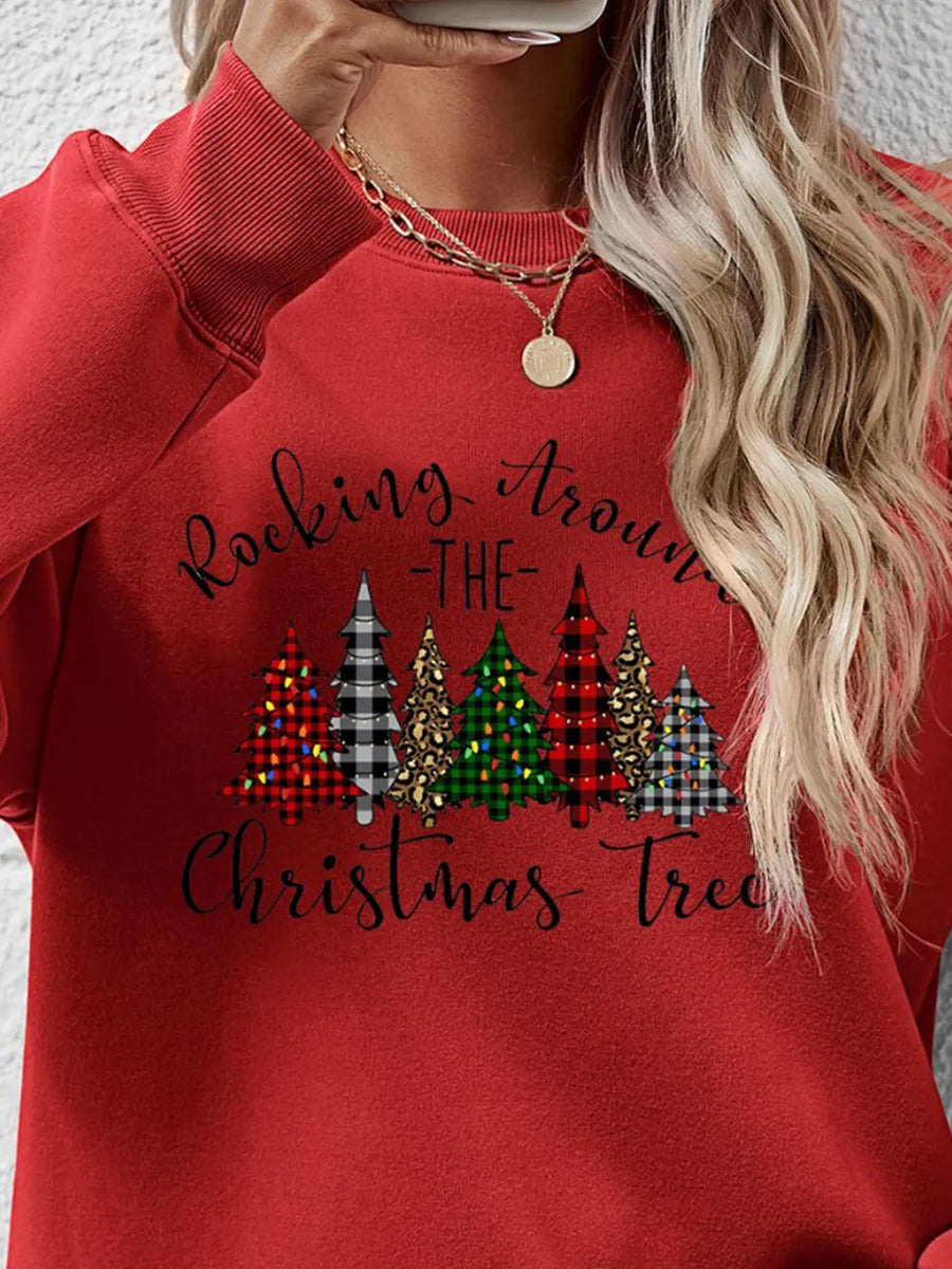 Red crewneck sweatshirt with a graphic of assorted Christmas trees and text.