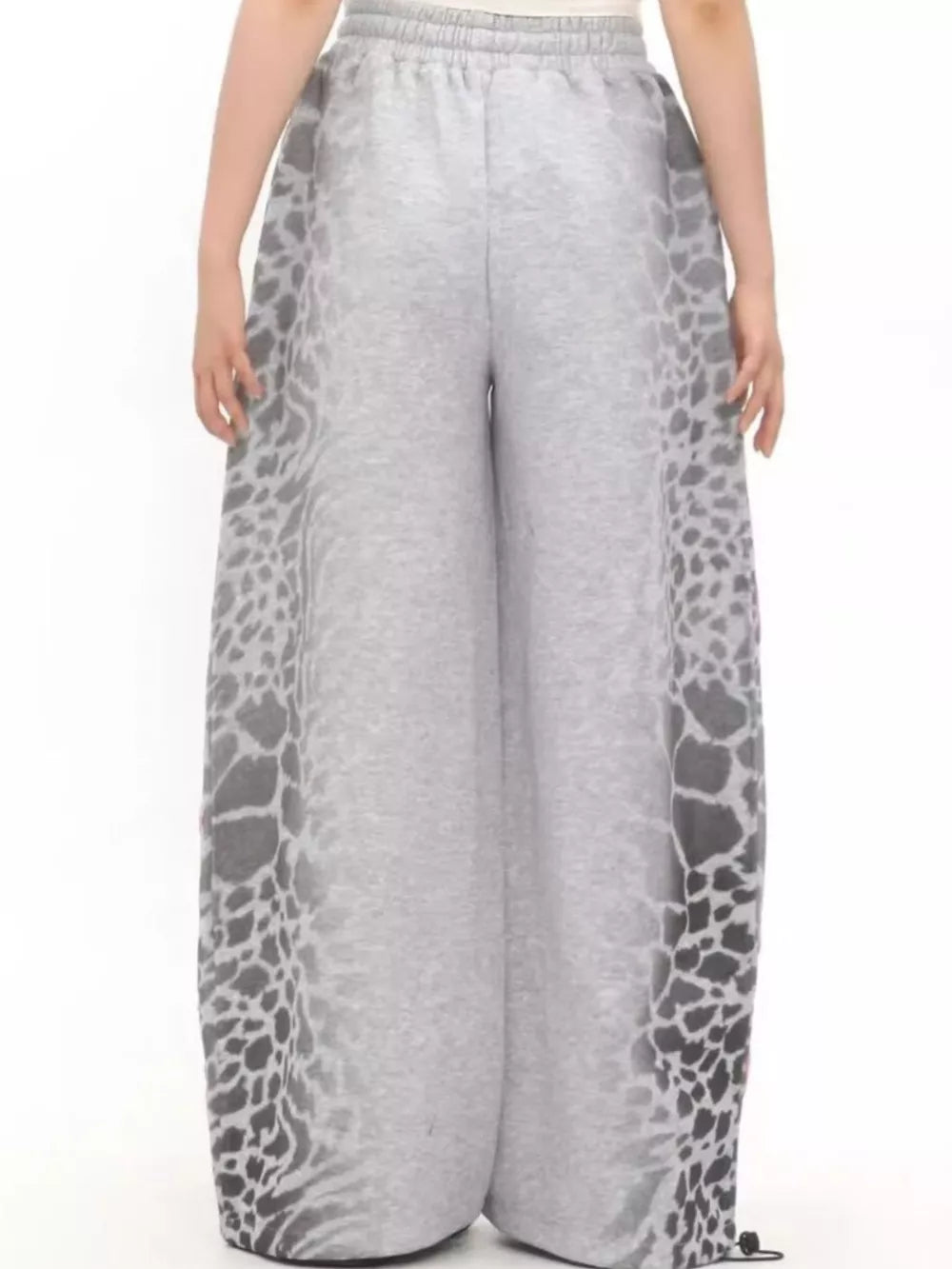 Men's grey cotton sweatpants with leopard print side panels and drawstring waist.