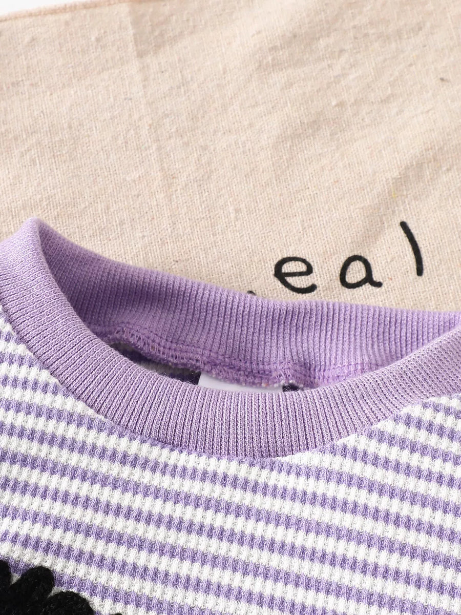 65% cotton, 35% polyester Care instructions: Machine wash cold pajama set in Light Purple with relaxed silhouette