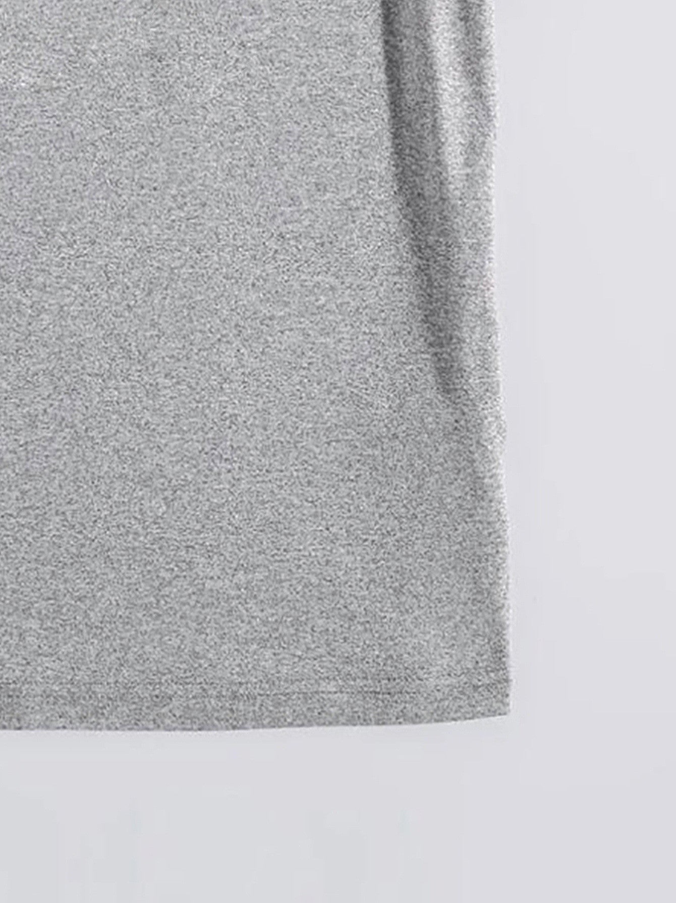 Gray oversized graphic tee with a heathered texture.