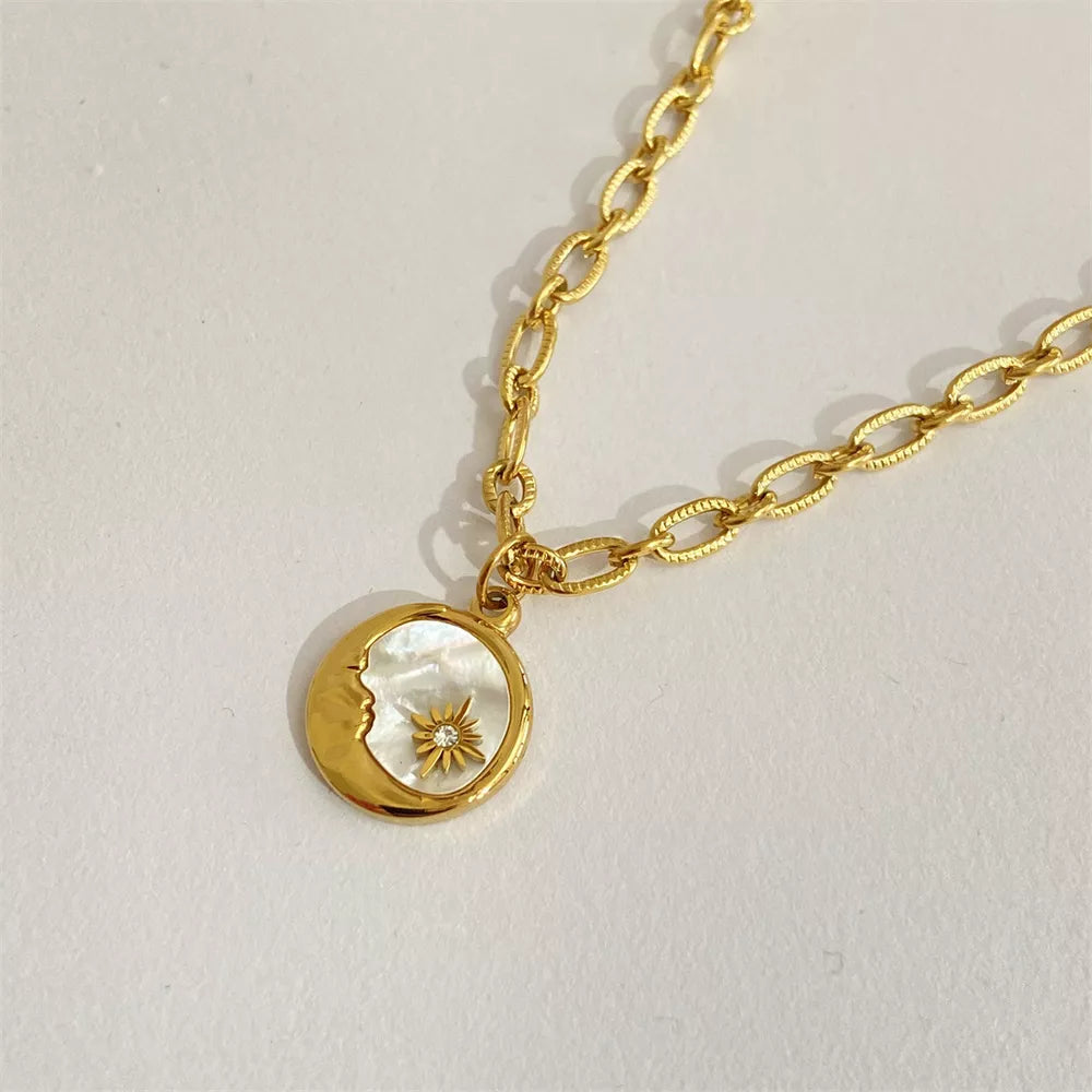 necklace in ivory with celestial and gold-plated