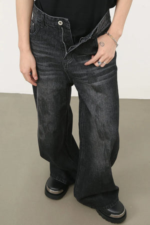 Oversized charcoal wash denim jeans with a relaxed fit and wide leg.