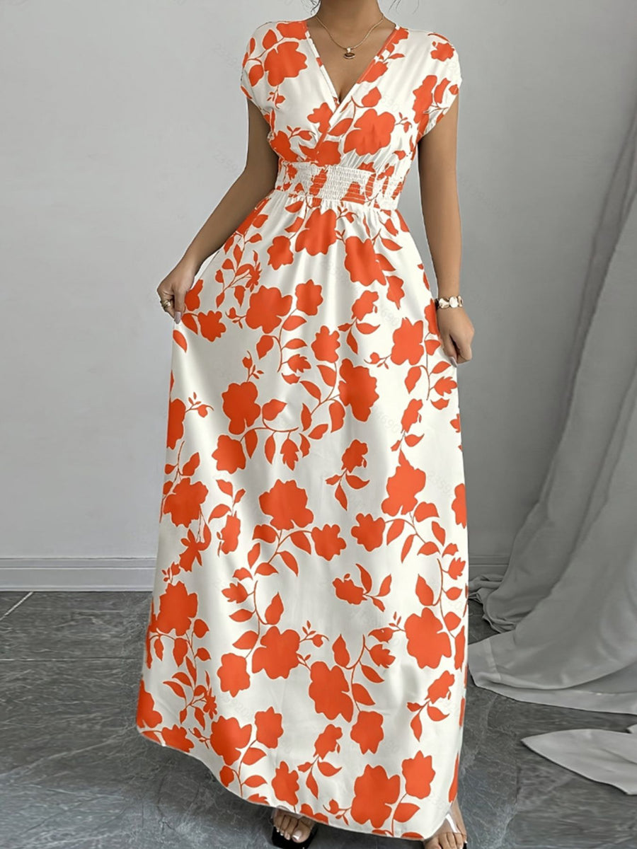 Maxi dress with orange floral print, V-neck, cap sleeves, and smocked waist.