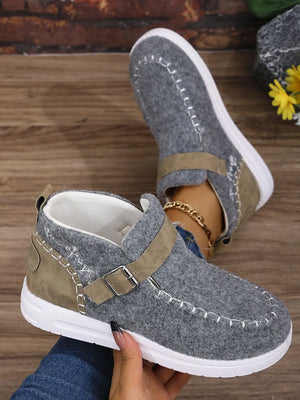 Gray textured stitch-detail buckle sneakers with contrast suede accents and white soles.