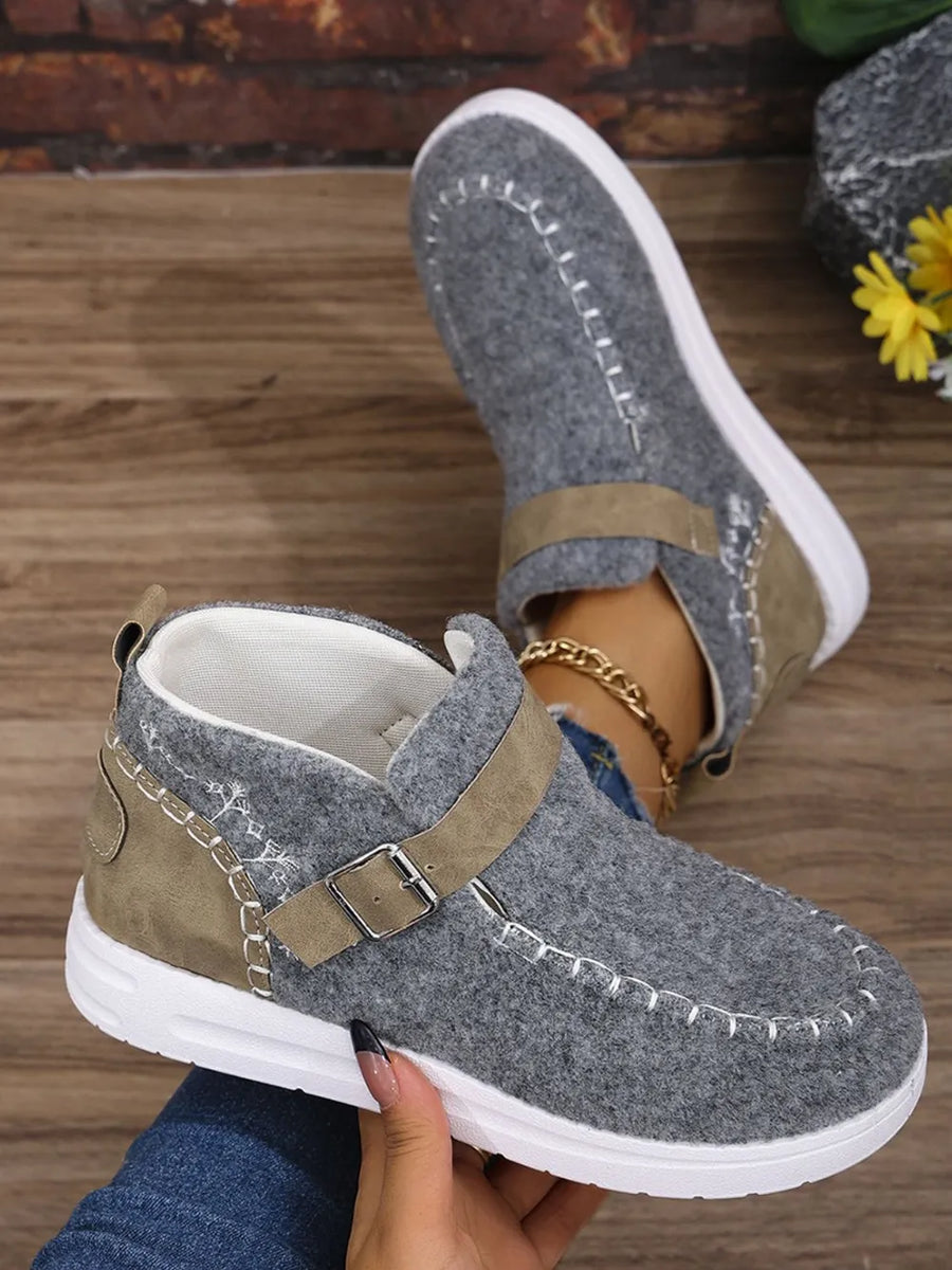 Gray textured stitch-detail buckle sneakers with contrast suede accents and white soles.
