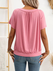 Pink ruched V-neck t-shirt with short sleeves and banded hem.