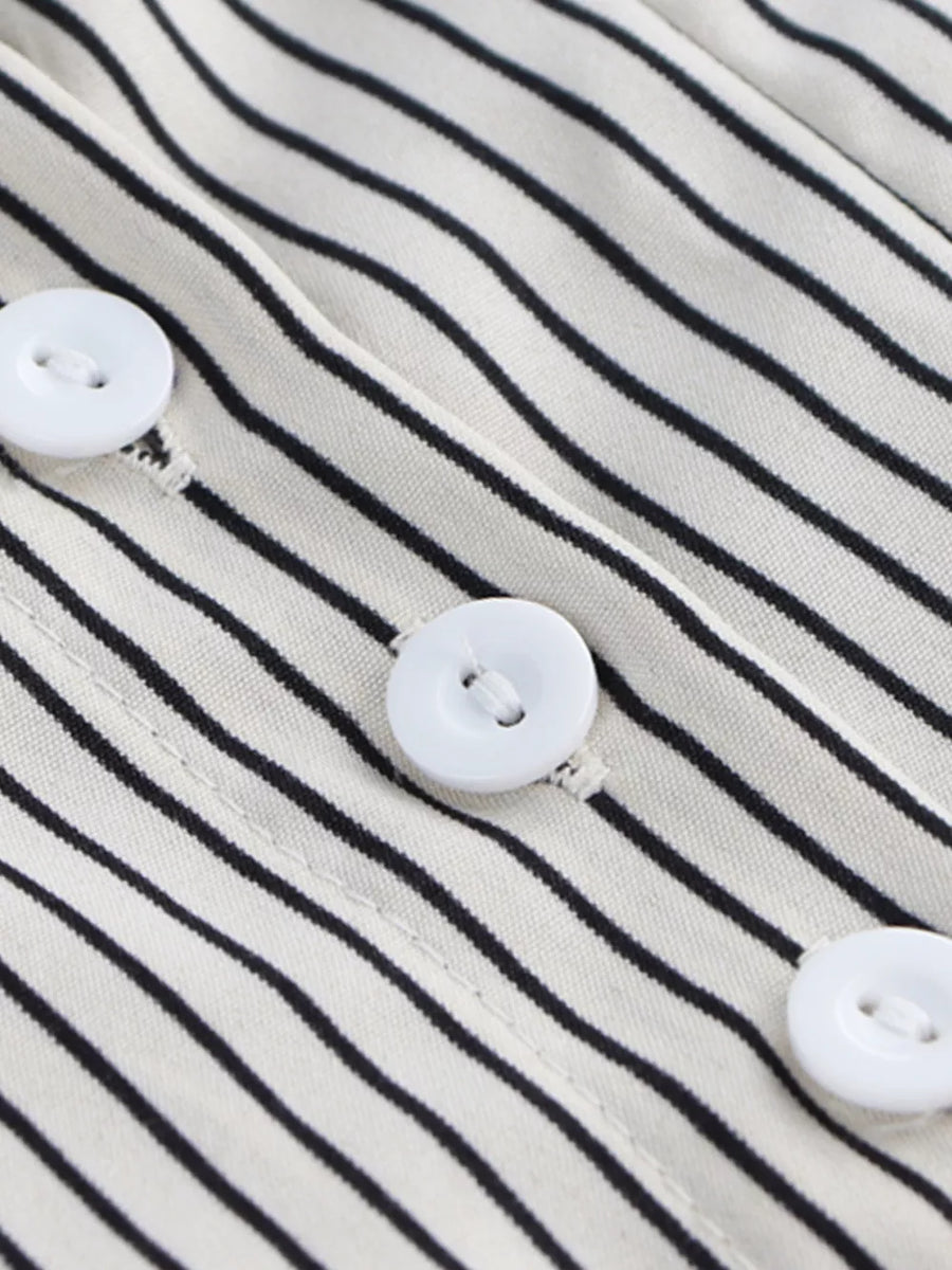 Maternity shirt with black and white stripes and white buttons.