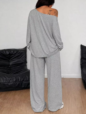 95% polyester, 5% elastane Care instructions: Machine wash cold lounge set in Black with relaxed silhouette