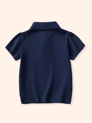 Navy blue toddler polo shirt with short puff sleeves and a classic collar.