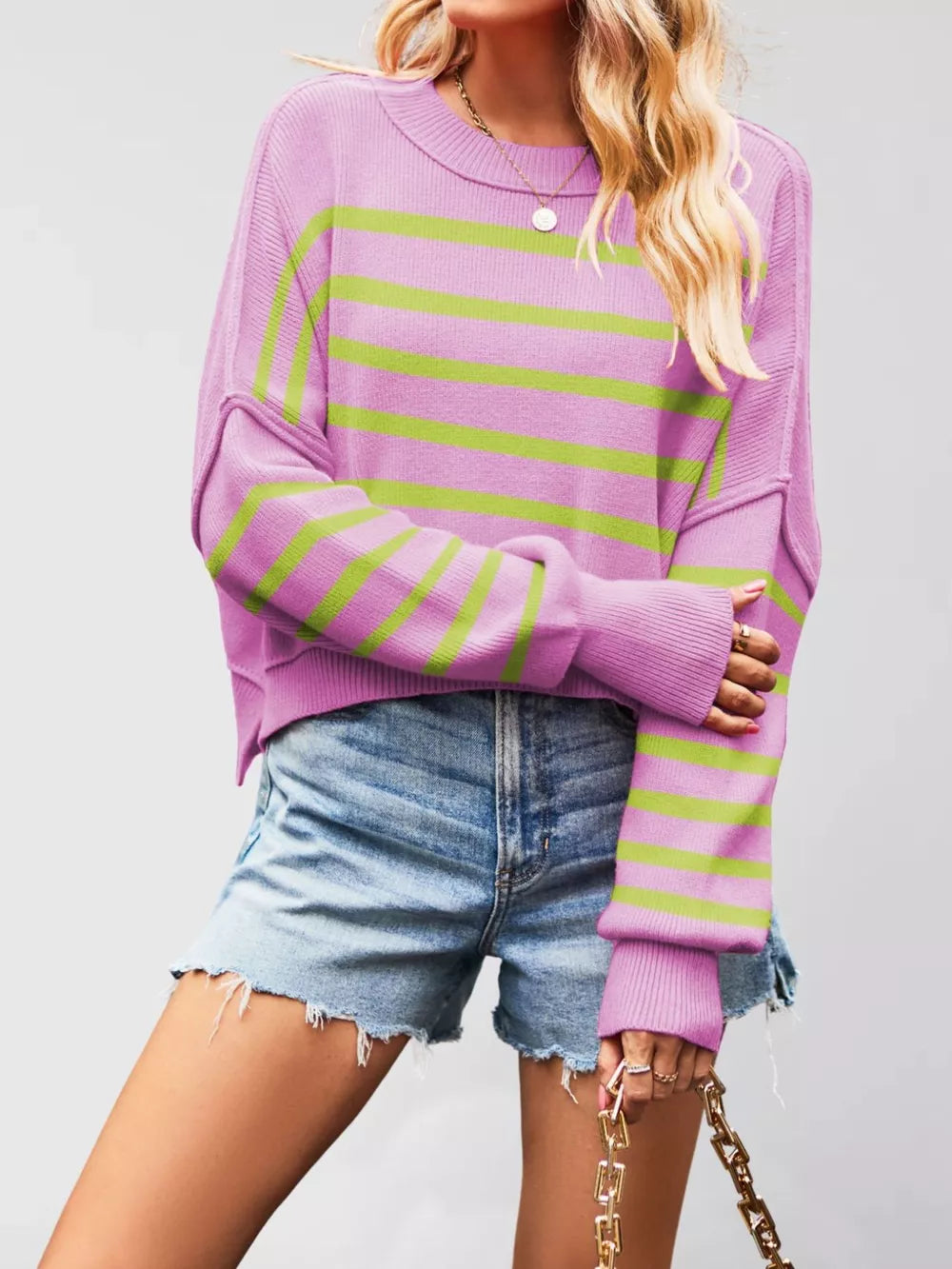 100% polyester Care instructions: Machine wash cold crewneck sweater in Black with relaxed silhouette