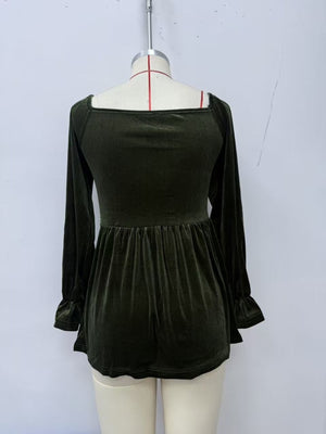 100% polyester Care instructions: Machine wash cold peplum top in Black with flared silhouette