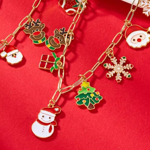 necklace in gold with christmas-theme and charms
