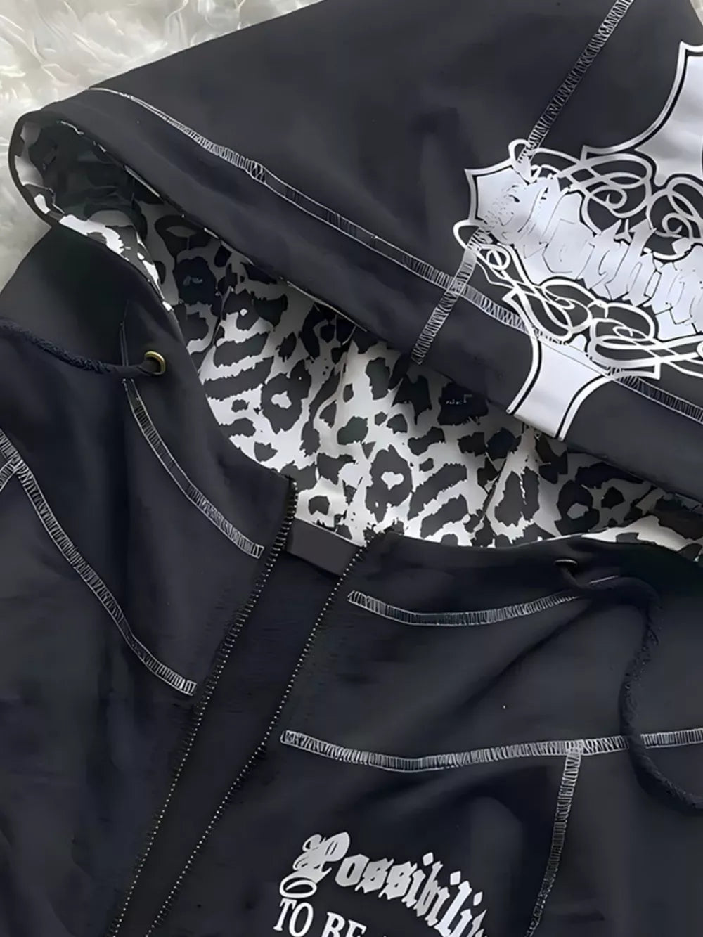 Black zip hoodie with hip-length and zip-front
