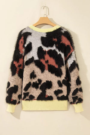 cream pullover sweater with ribbed cuffs and long sleeve