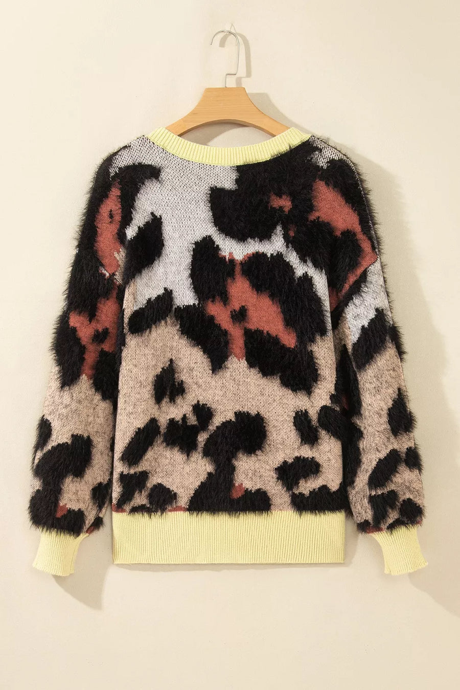 cream pullover sweater with ribbed cuffs and long sleeve